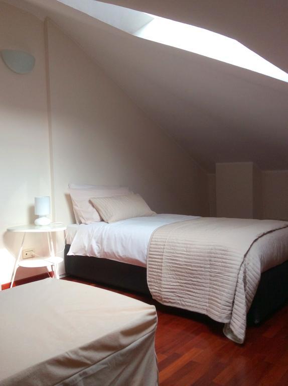 Apartment La Mansarda Алба Стая снимка