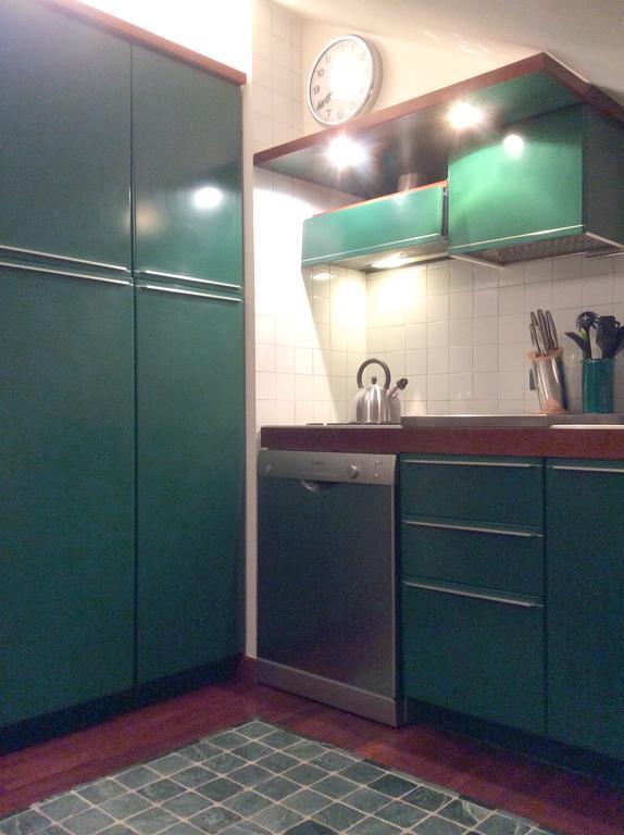 Apartment La Mansarda Алба Стая снимка